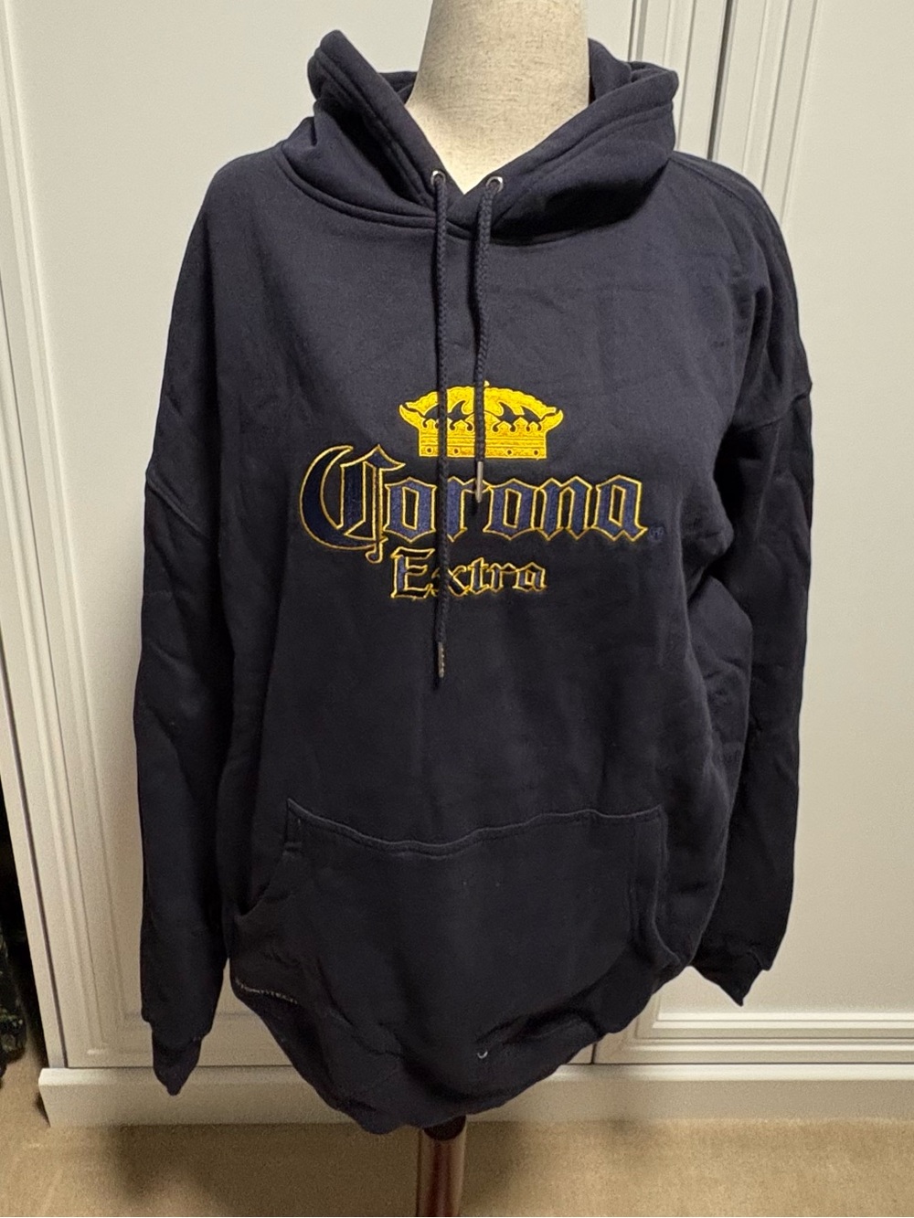 Stormtech Navy Hoodie with Yellow Corona Logo.  NWOT